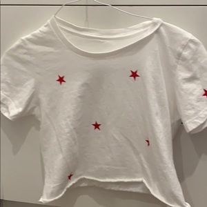cropped white shirt with red stars